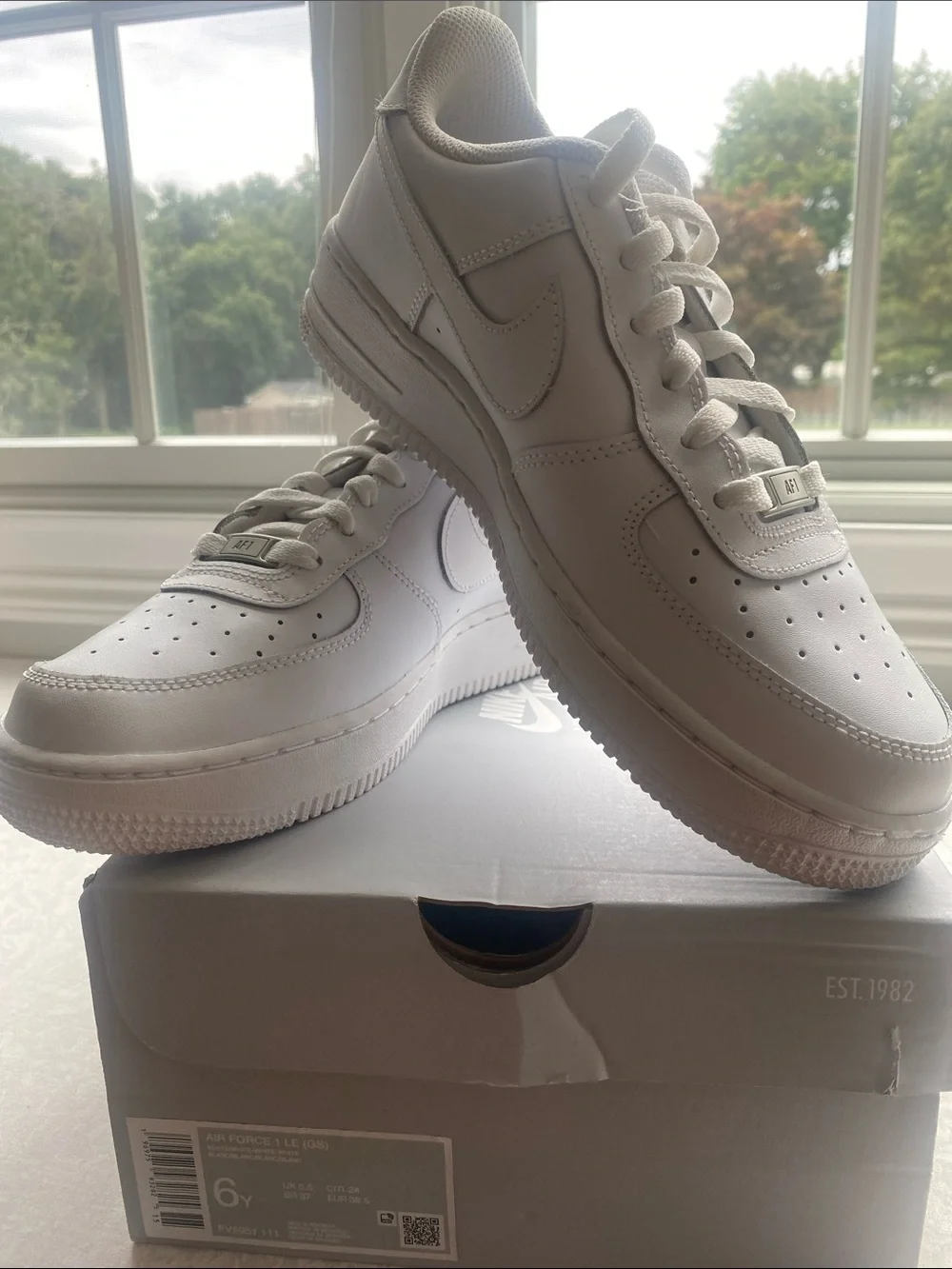 Nike Air Force Kids All-White Low-Top Leather Sneakers